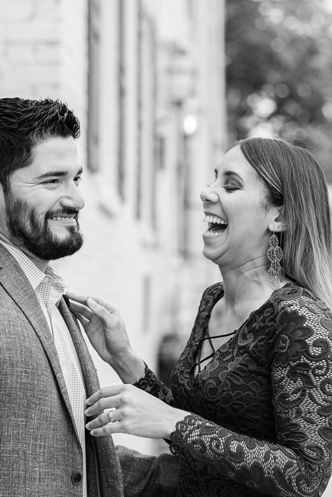 bride laughs during fall engagement session