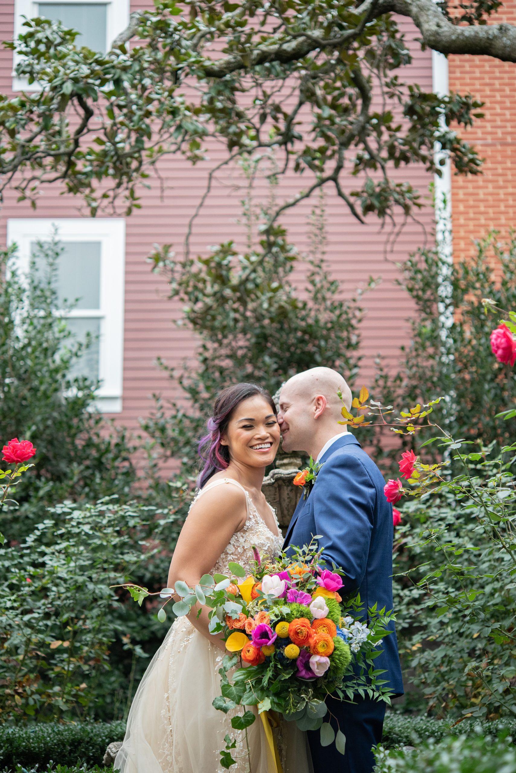groom nuzzles bride's cheek during wedding portraits in DMV