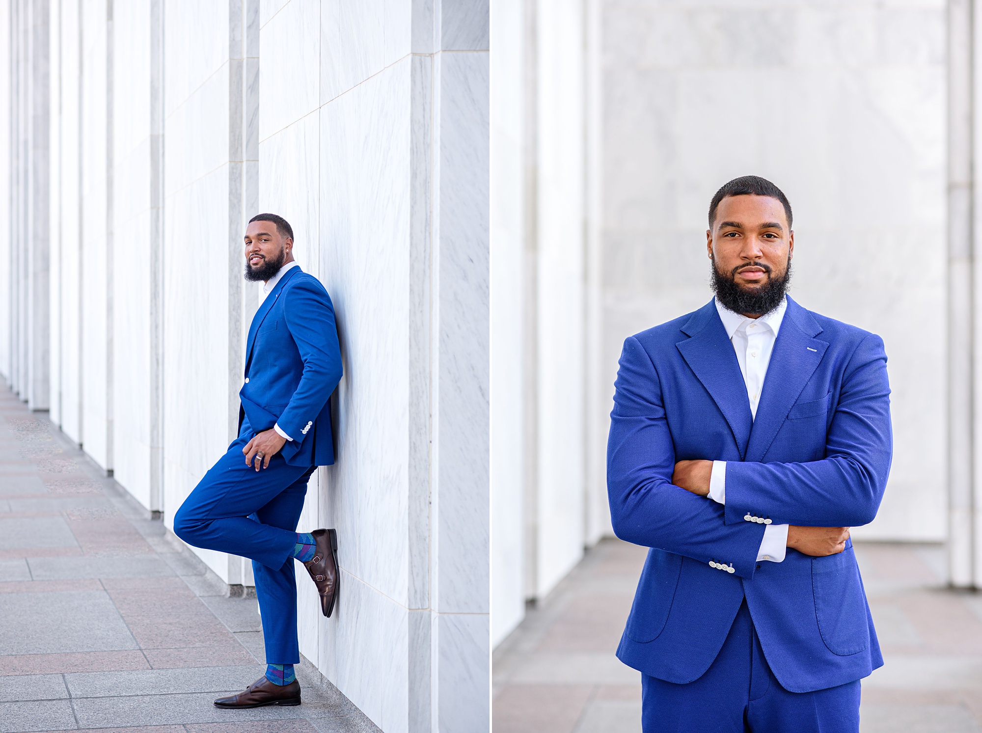husband in blue suit leans against white marble wall in DC
