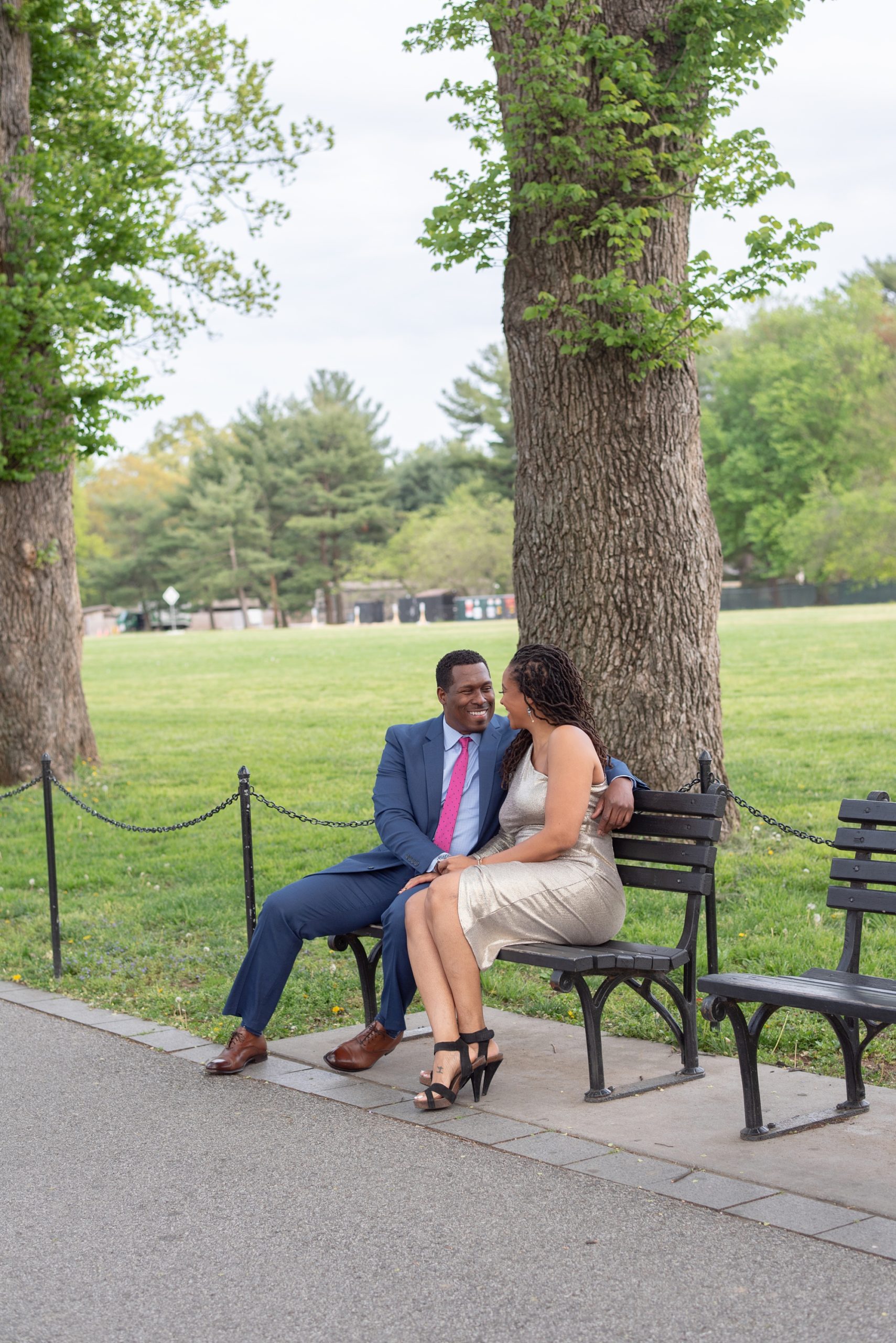 couple laughs together during DC engagement photos