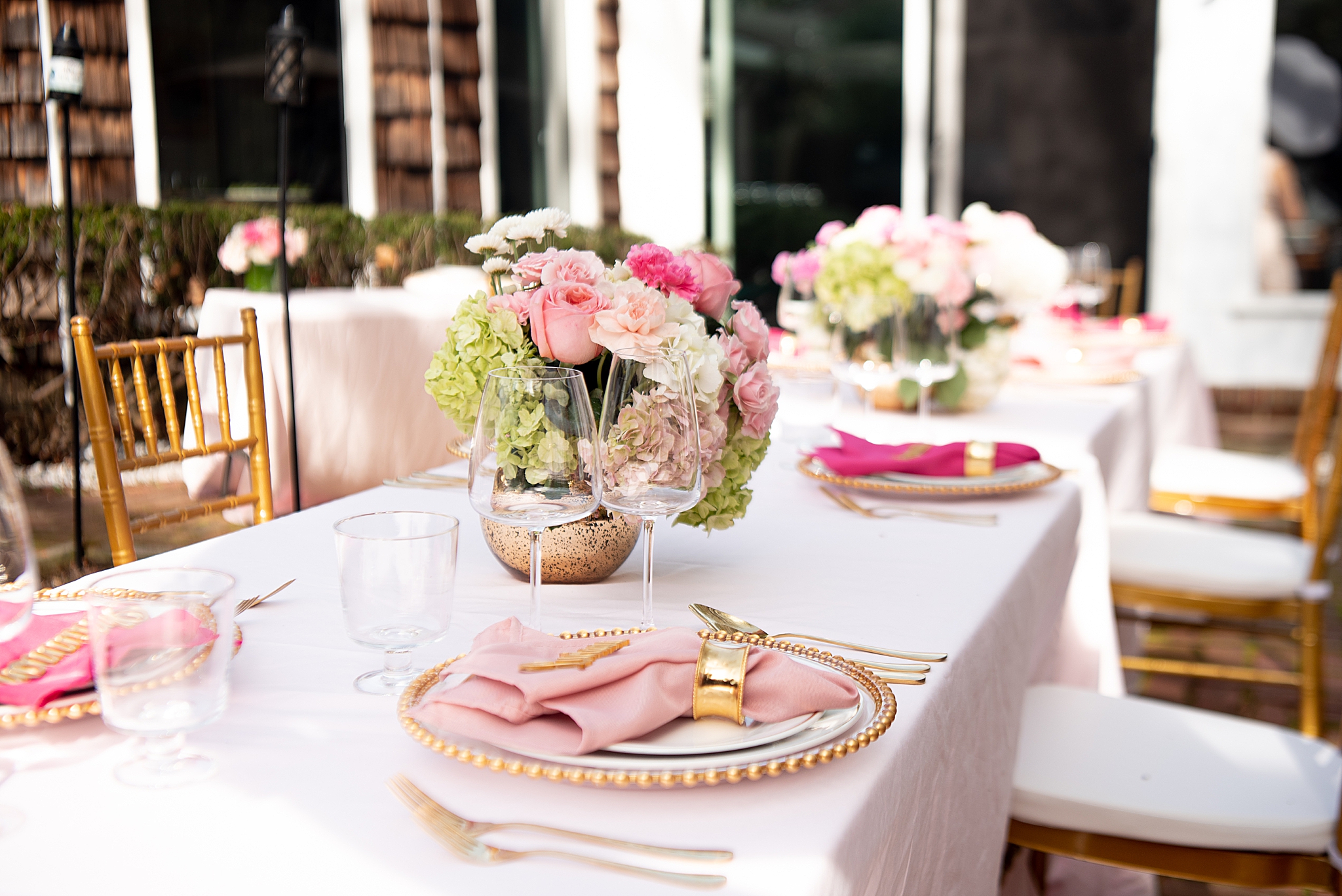 backyard bridal shower with light pink and gold details