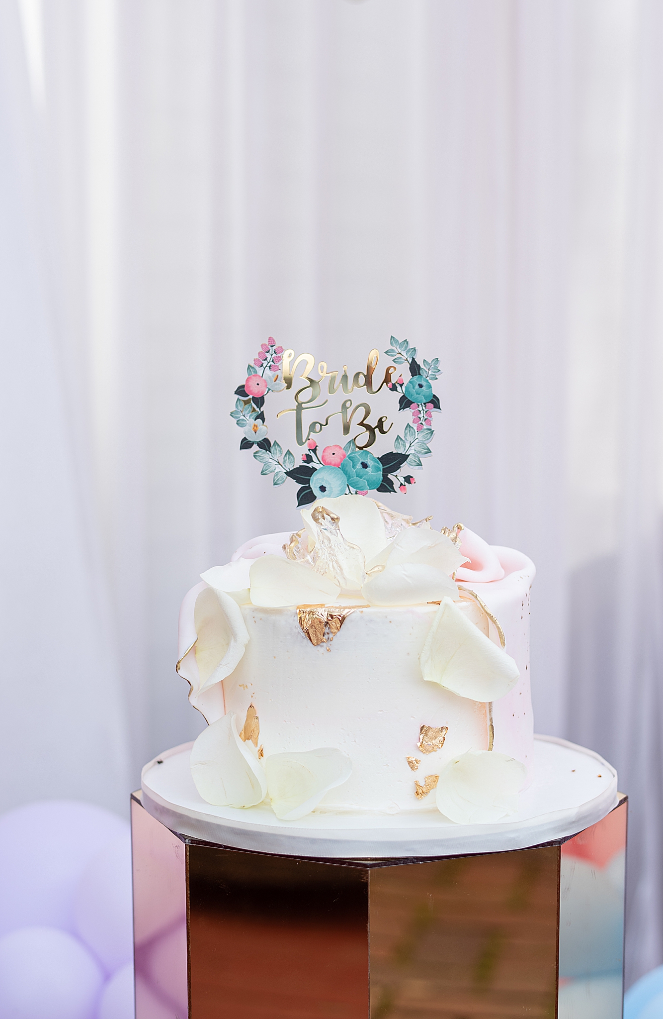 cake with bride to be topper