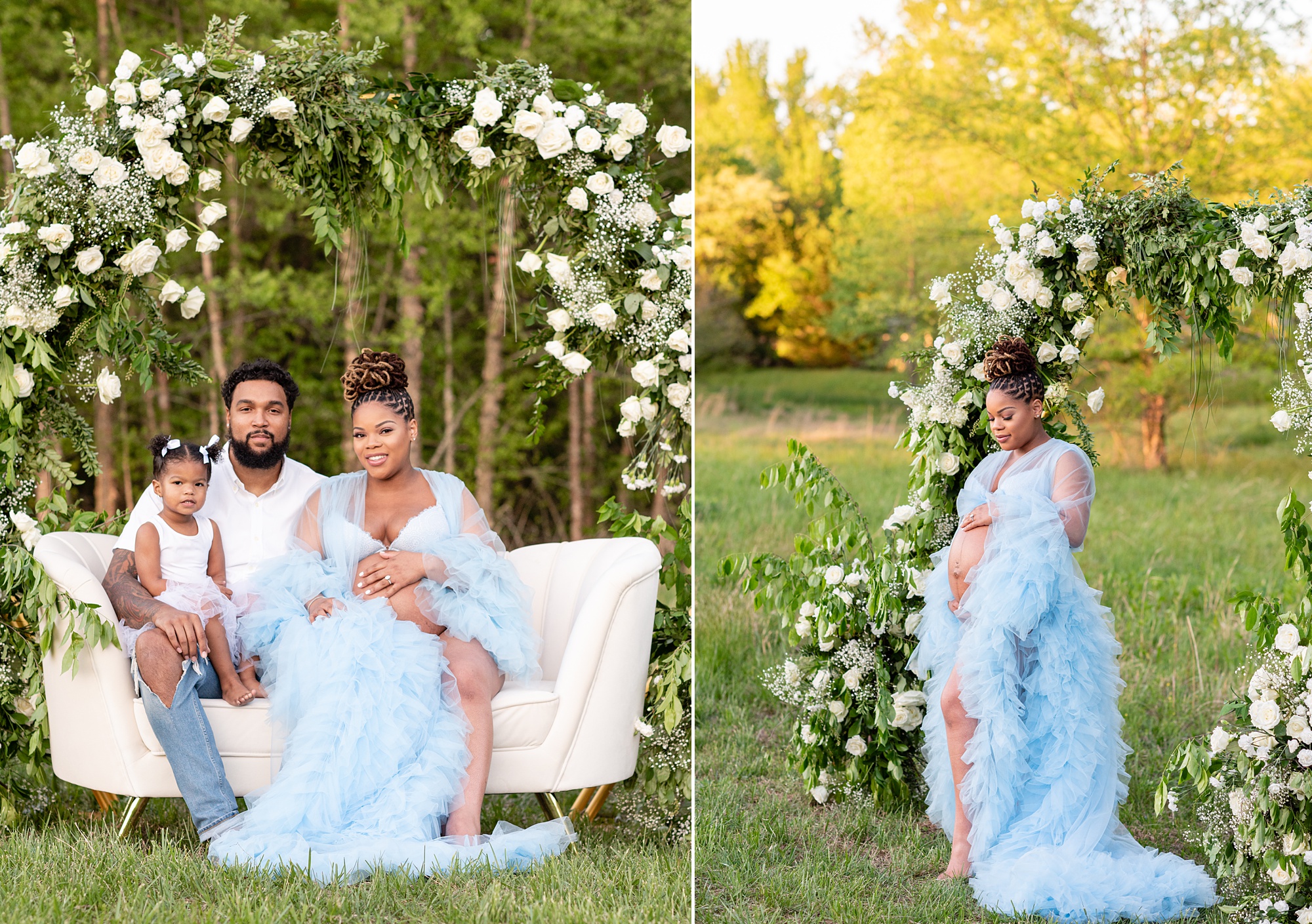 expecting parents pose by floral arbor with white flowers 