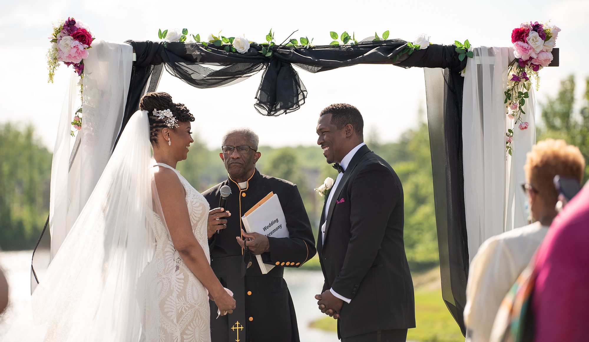 bride and groom exchange vows during Upper Marlboro Lake Presidential Golf Course ceremony 