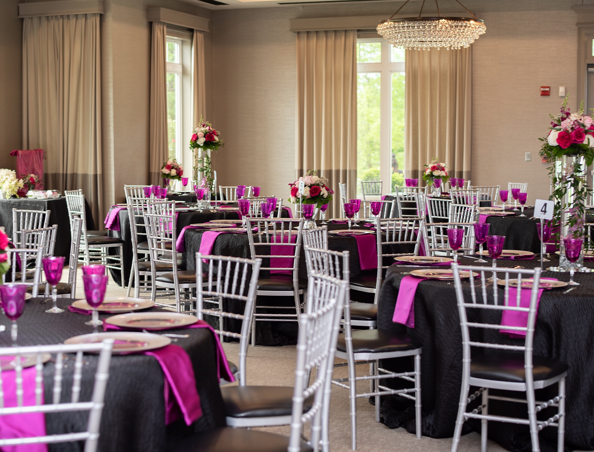 wedding reception with pink and black details 