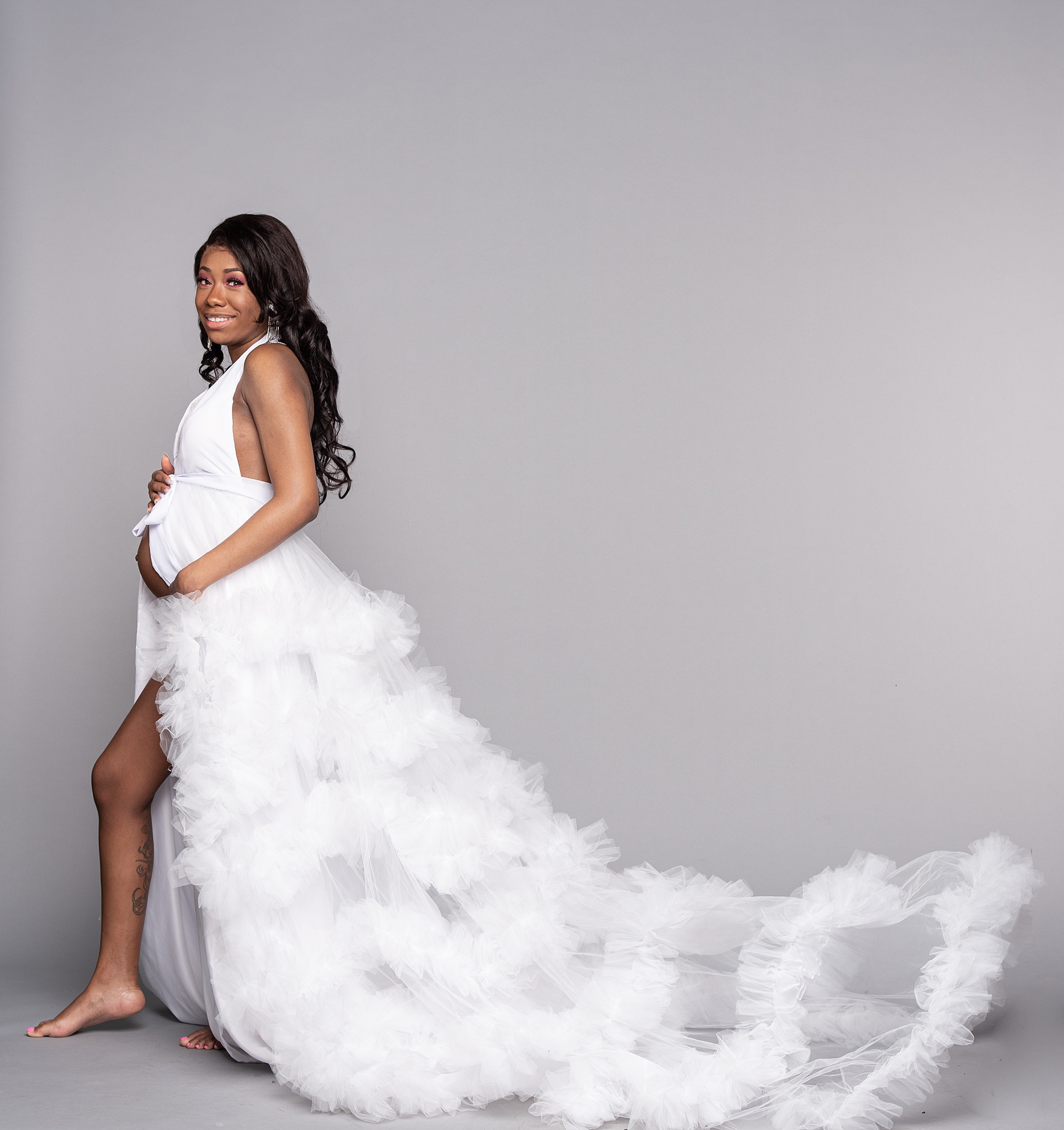 Washington DC studio maternity portraits of mother in white gown