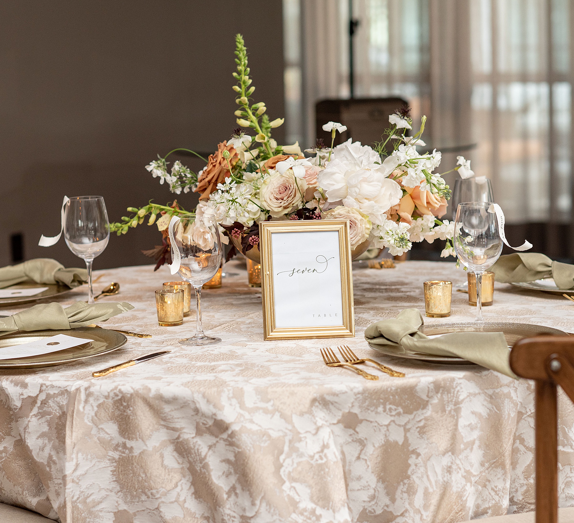 reception details with gold candle holders