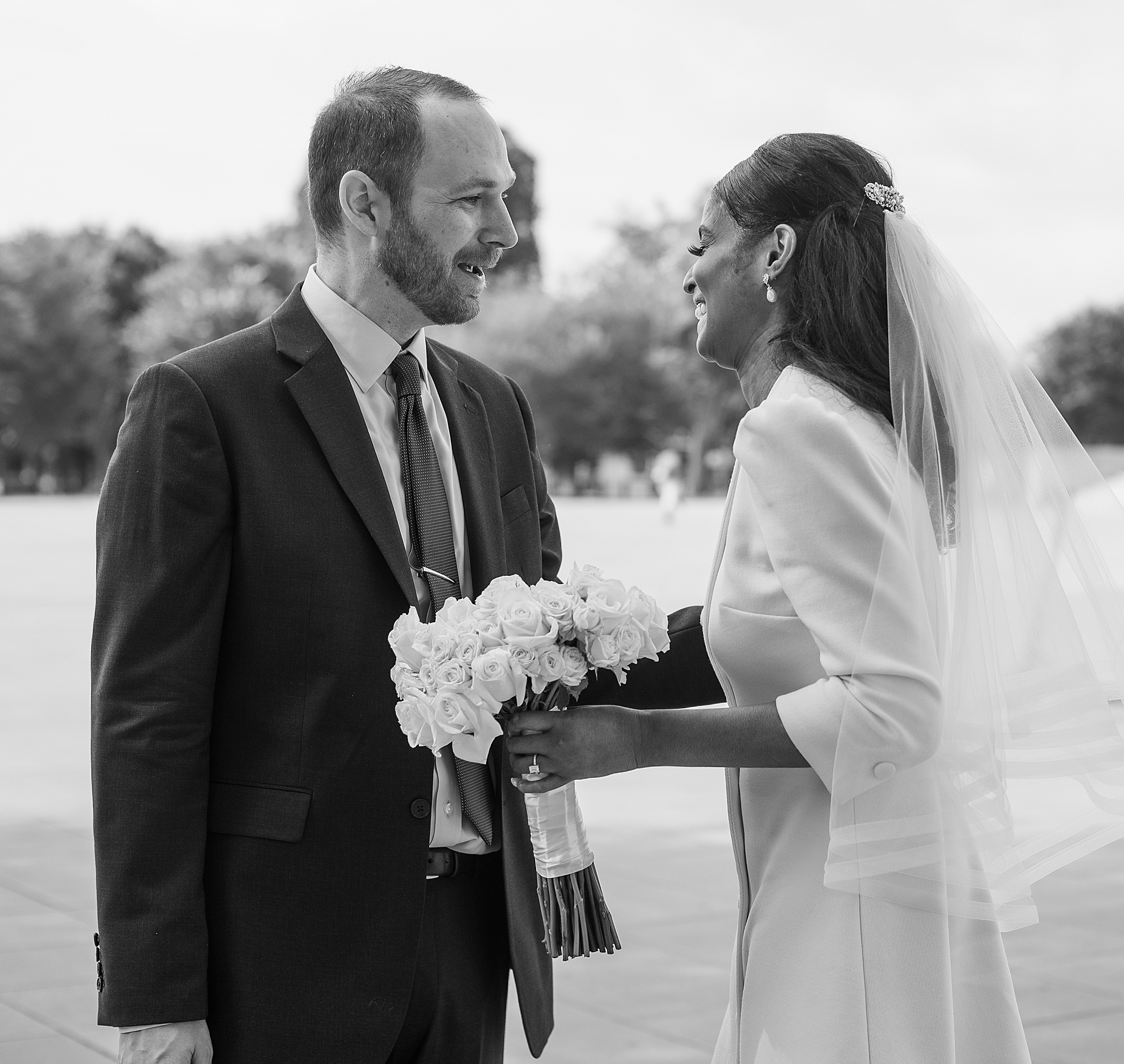 bride and groom have first look before Lincoln Memorial wedding