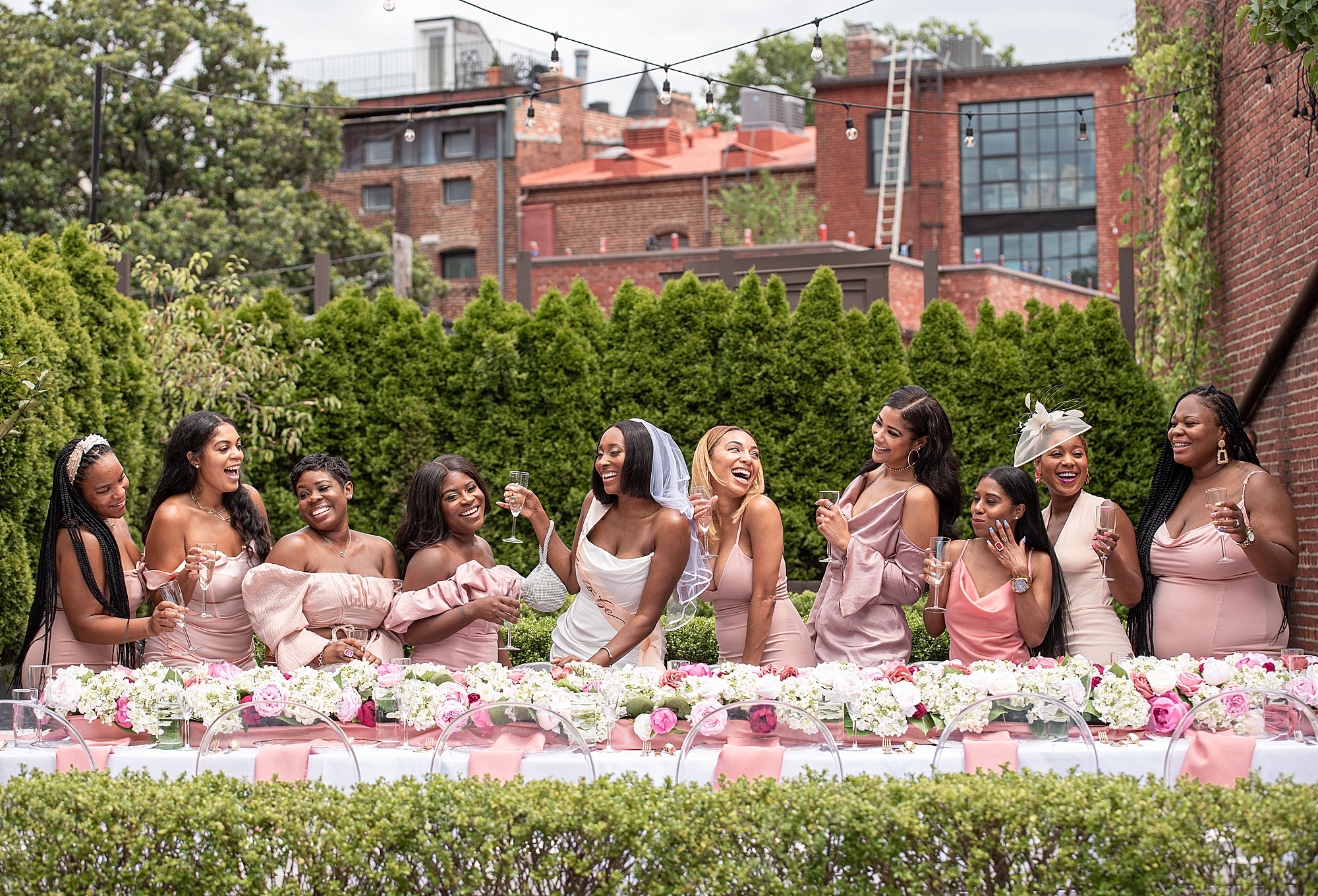 bride laughs with bridesmaids during DC wedding shower