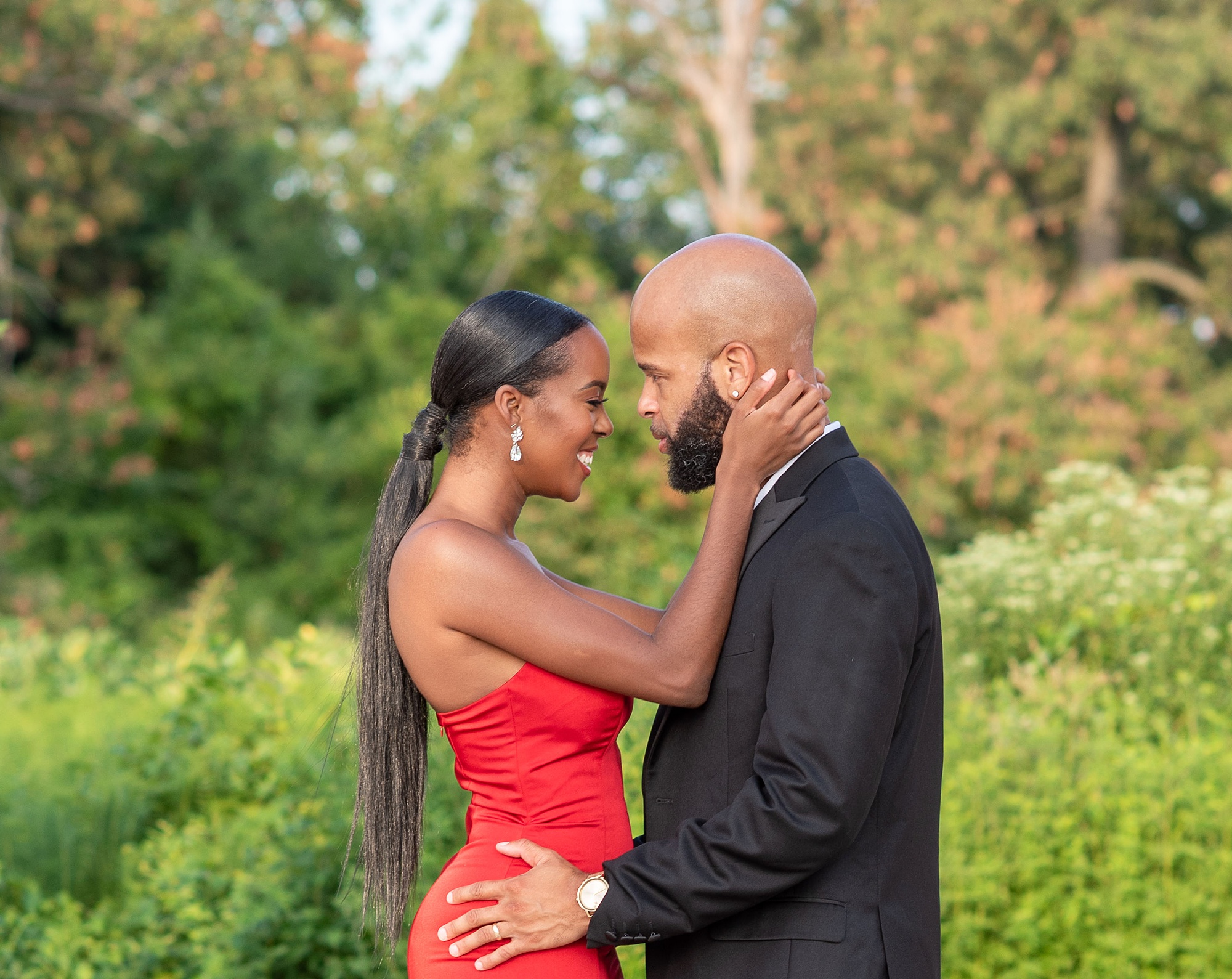 bride and groom smile during DC engagement session 