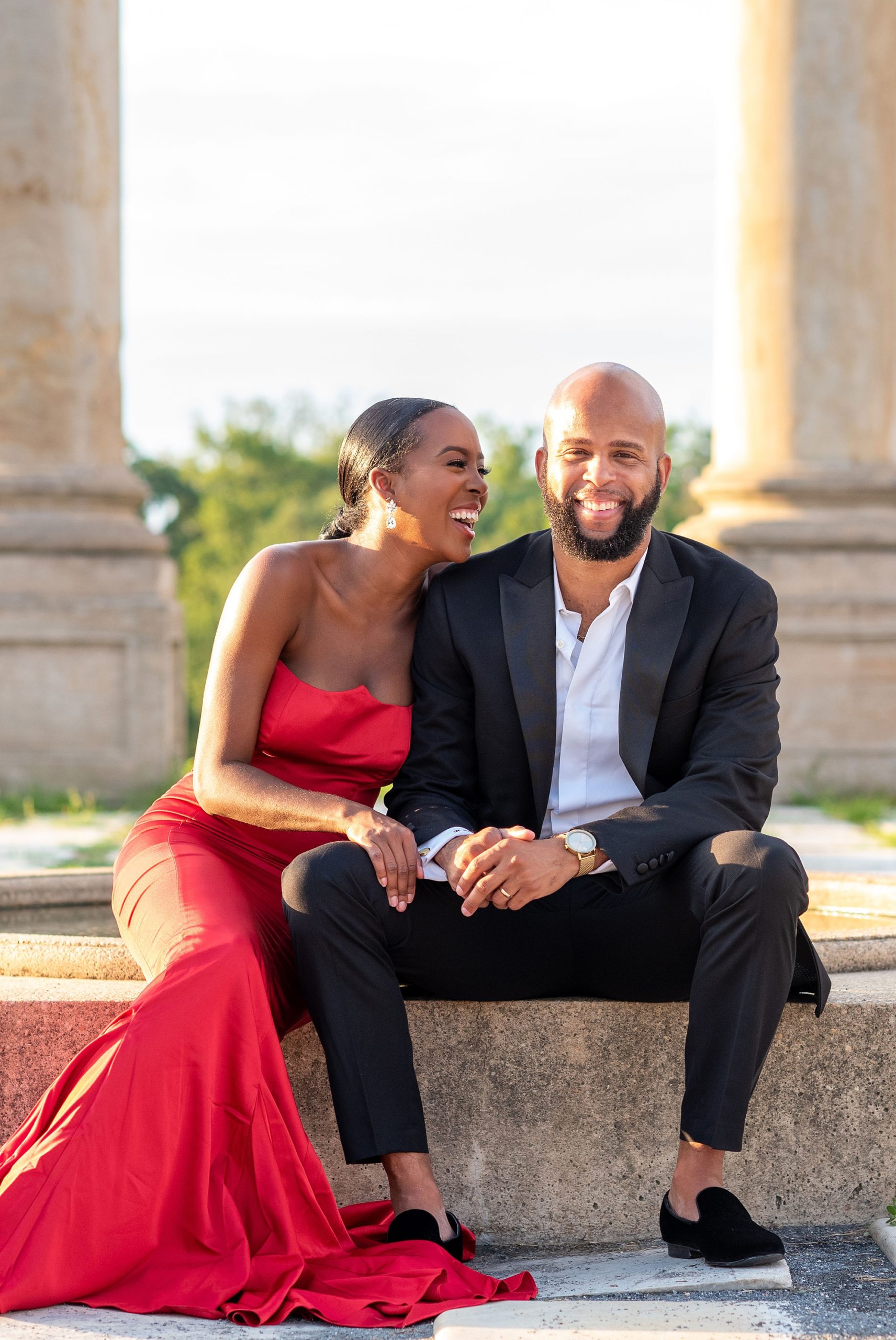 bride laughs at groom during engagement photos in DC