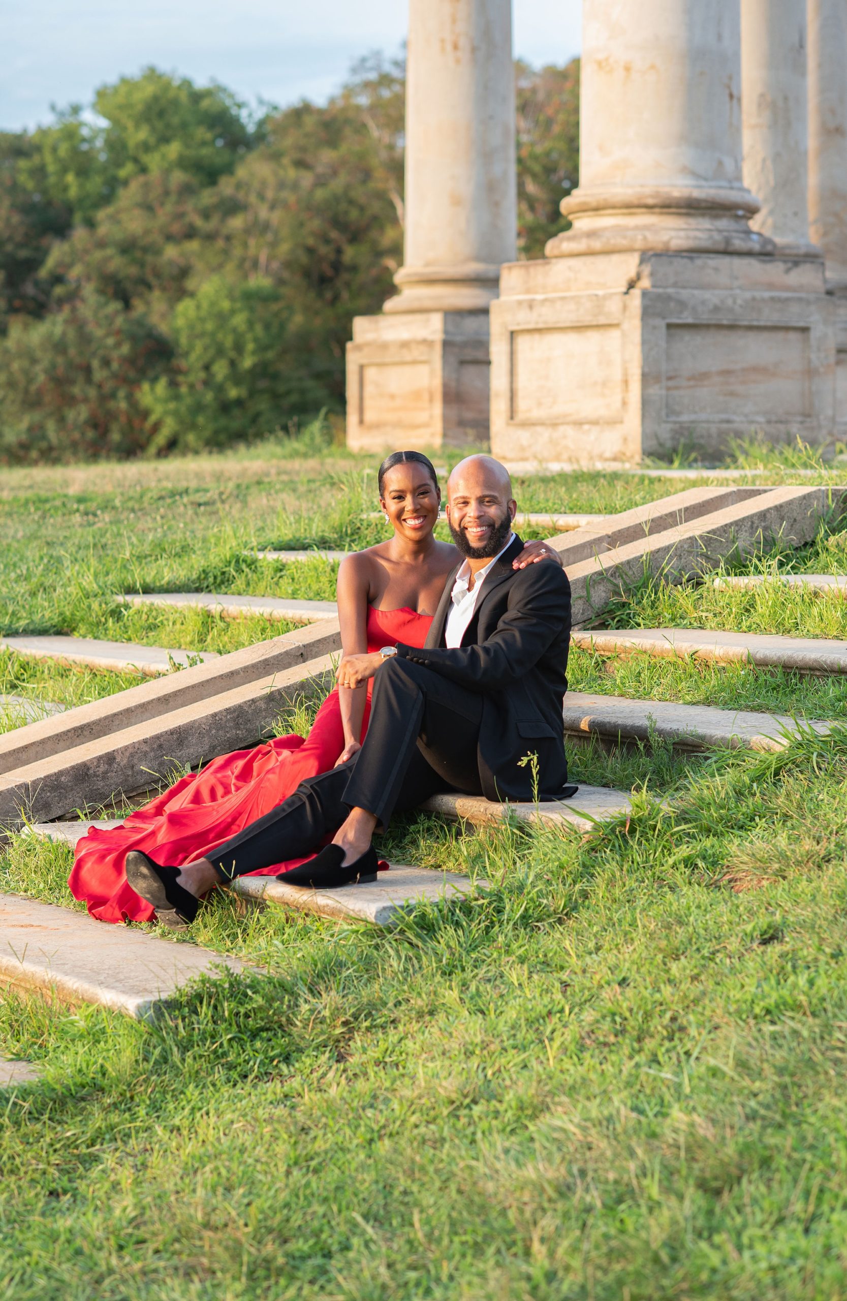 engaged couple sits on steps during DC engagement photos 