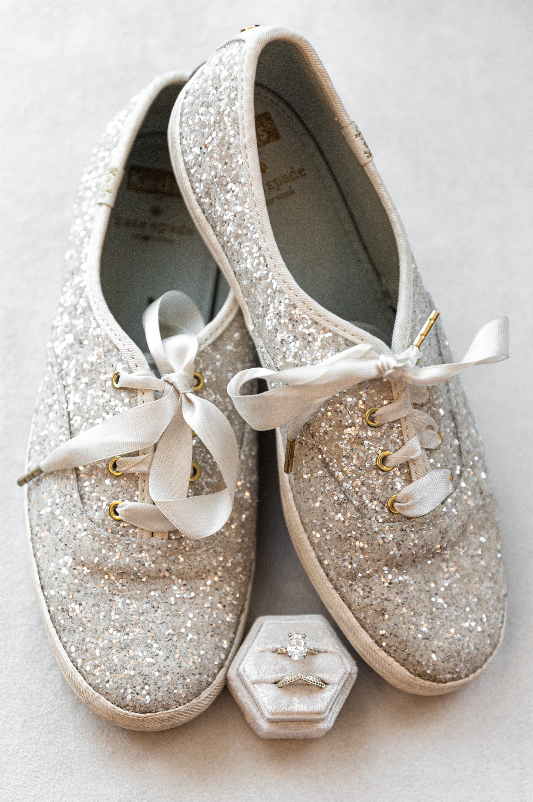 bride's sparkling Kids and wedding rings