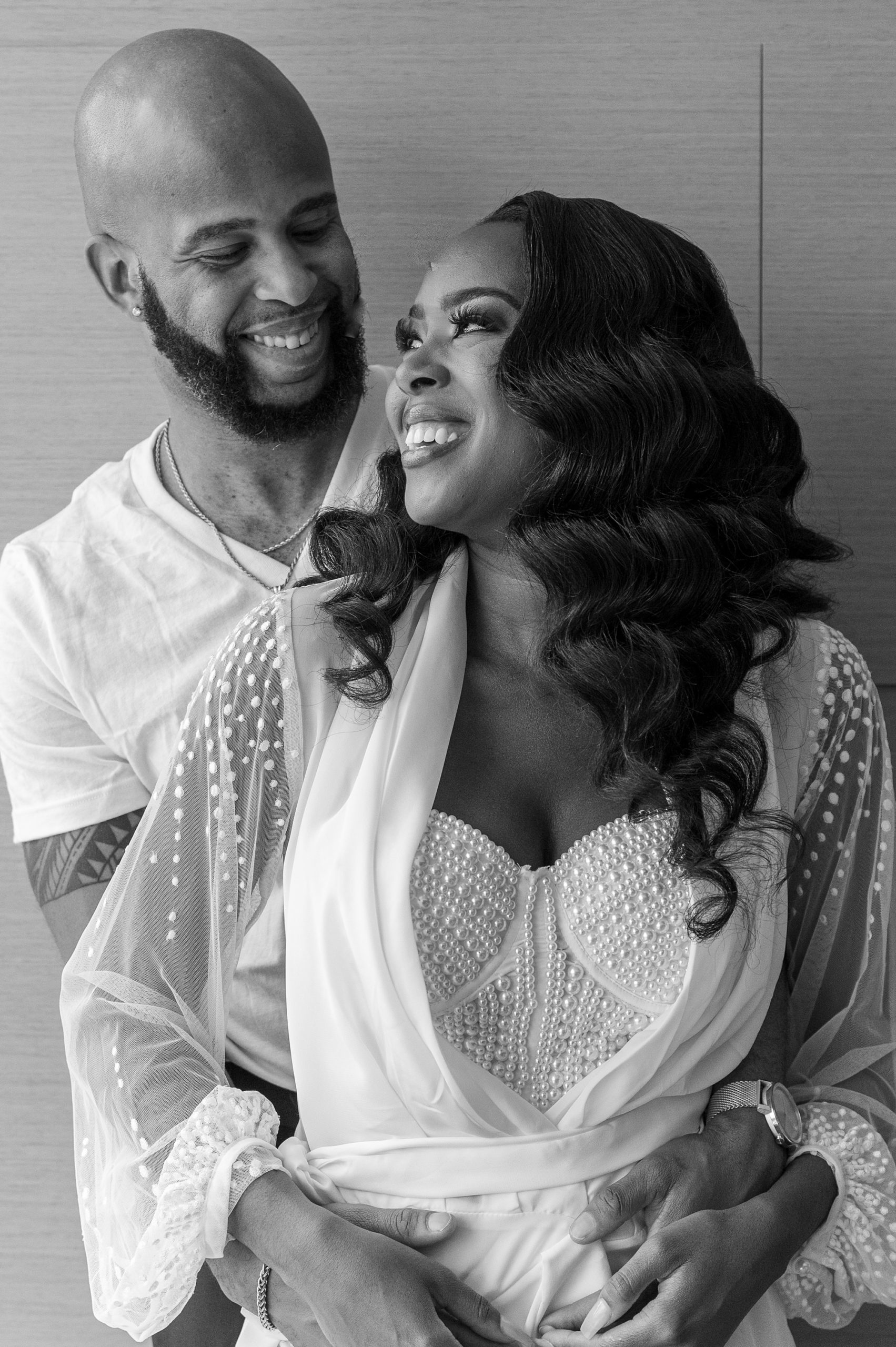 married couple laughs together before DC wedding