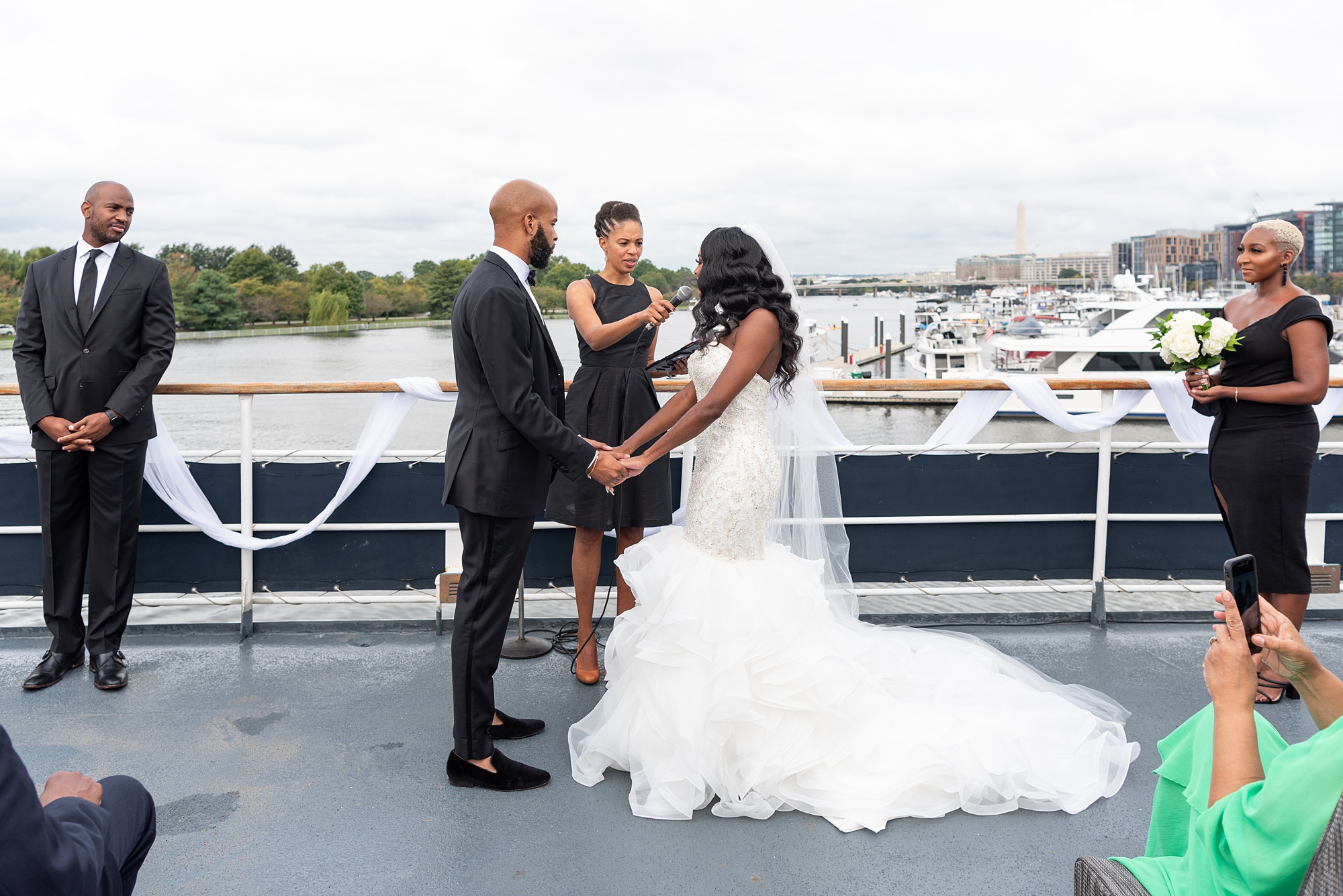 newlyweds have vow renewal on boat in Washington DC