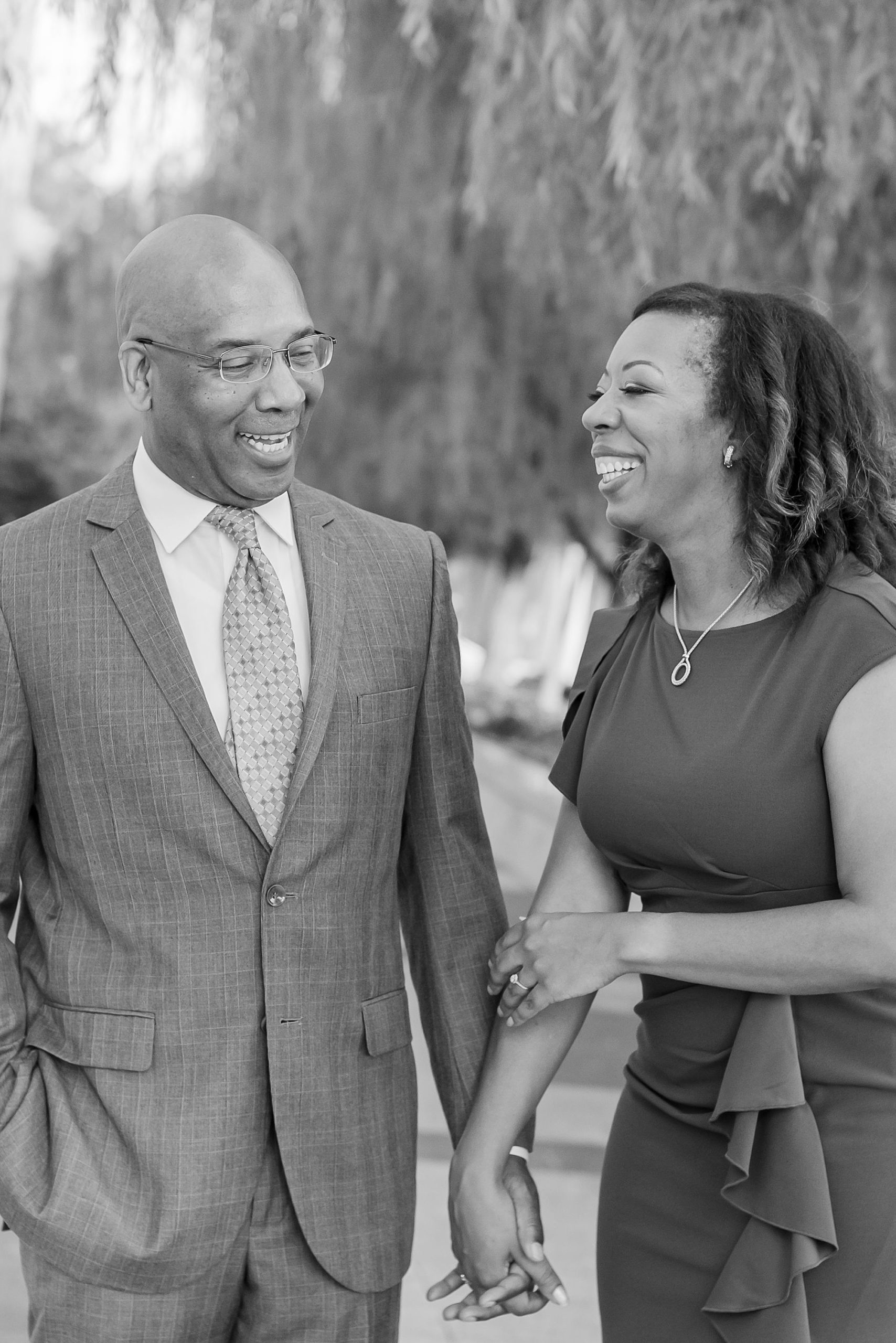 engaged couple laughs together during Kennedy Center engagement session 