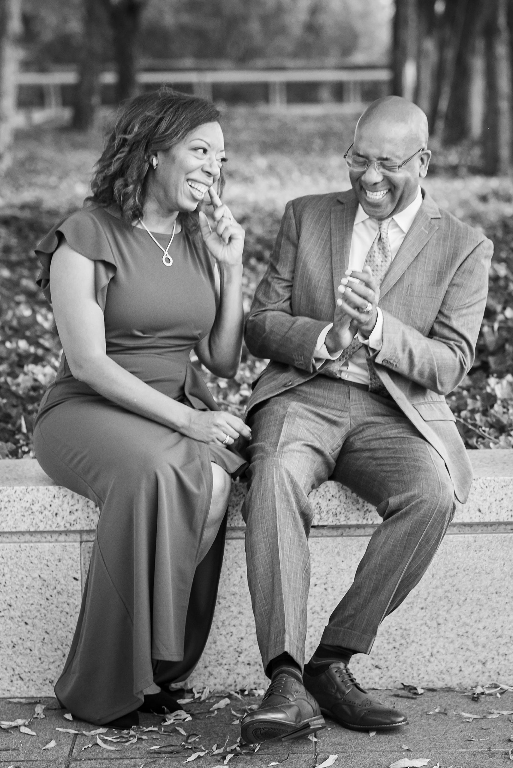 couple laughs together during Kennedy Center engagement session 