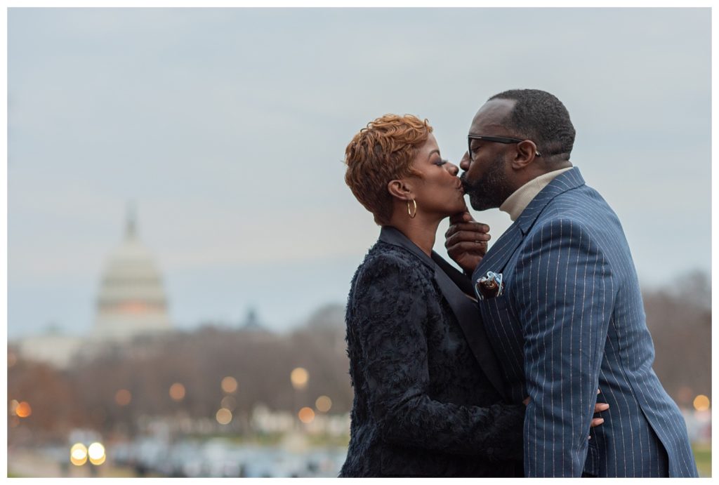 engagement couple posing with view of us capitol