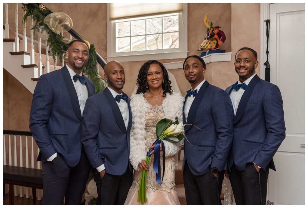 bride and groomsmen posing for pre-ceremony photos at D.C. elopement