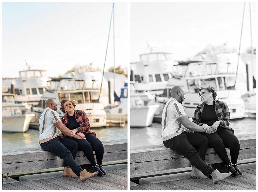 couple posing in front of boats at the wharf in dc