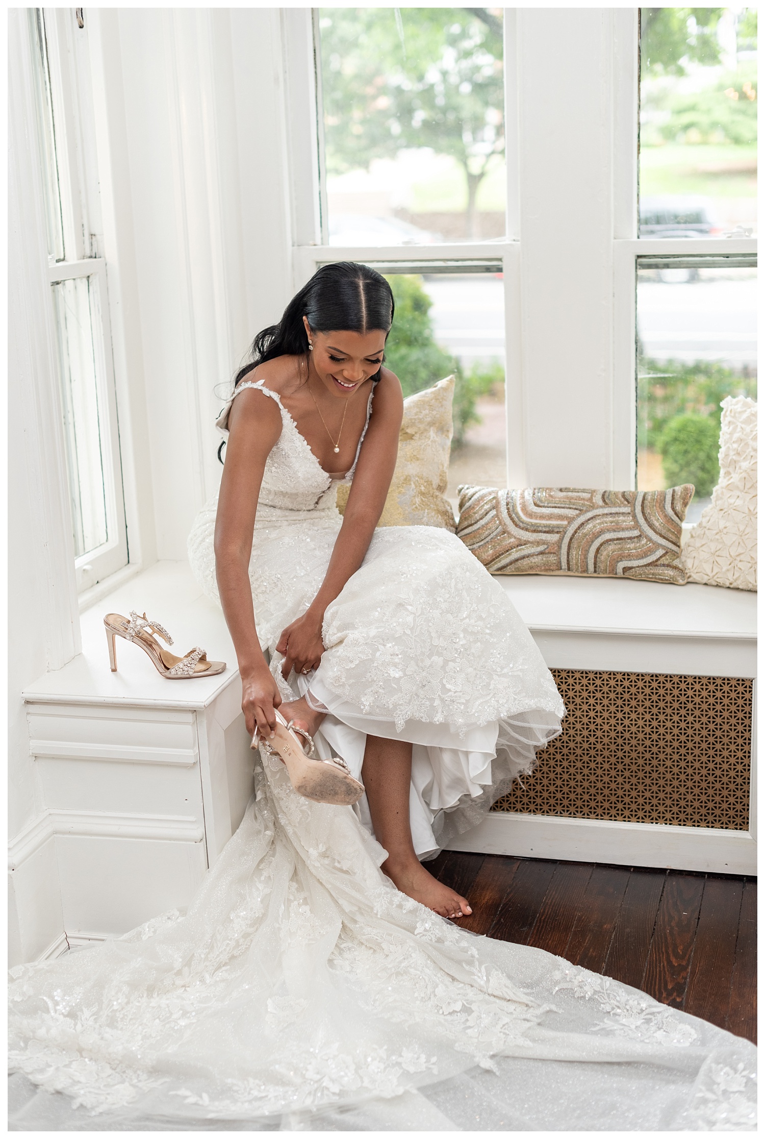 bride putting on her wedding shoes before the wedding in Georgetown