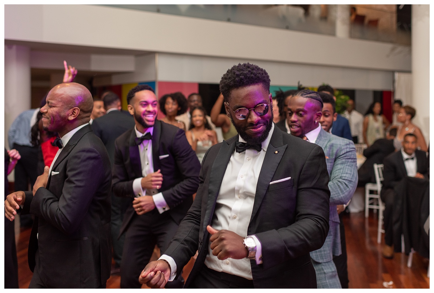 groomsmen and guests dancing at wedding reception in Washington, D.C.
