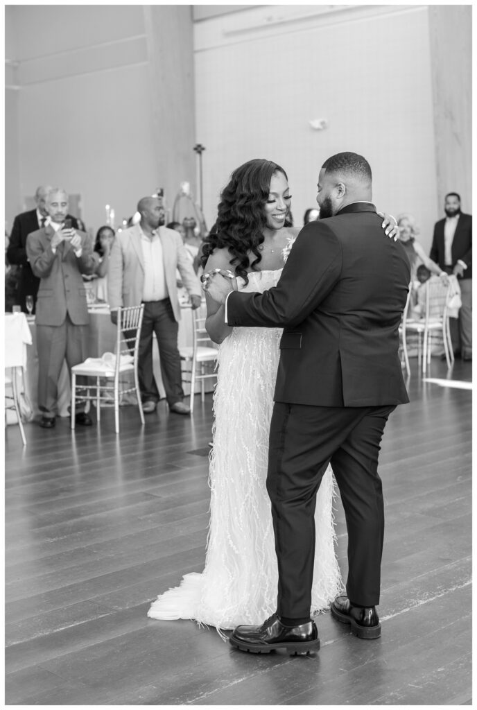 bride and groom's first dance at brunch wedding reception