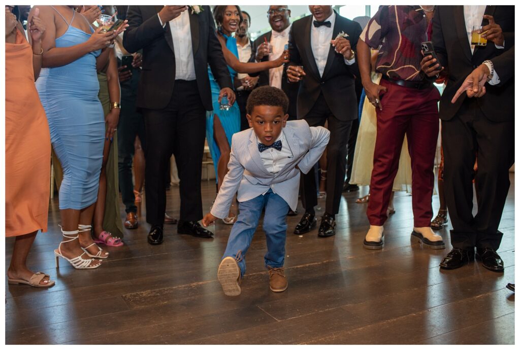 little boy dancing at wedding reception in Virginia