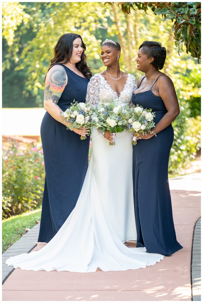 bride and bridesmaids laughing at Maryland wedding venue