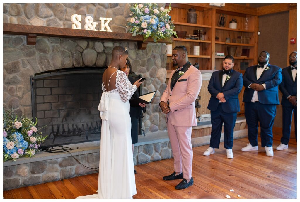 bride and groom exchanging vows at Maryland wedding ceremony