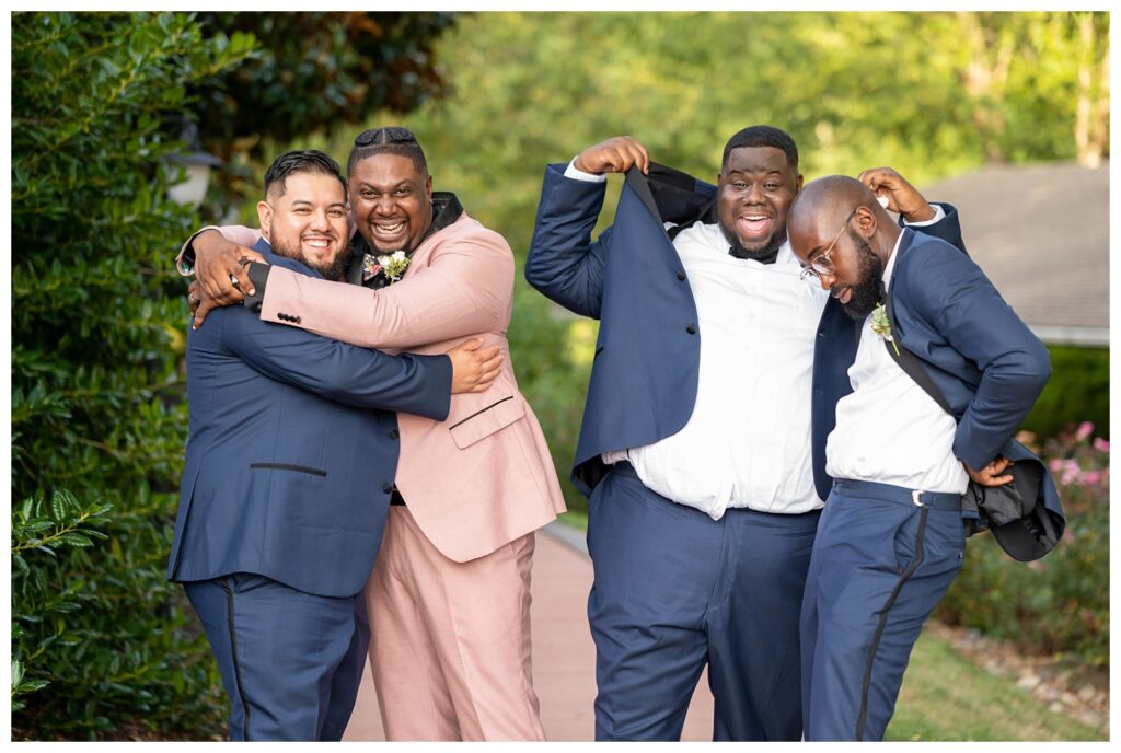 groomsmen laughing at Maryland wedding in Annapolis