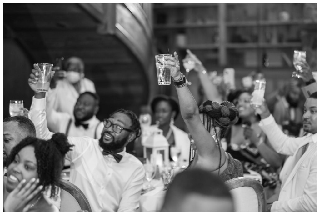 guests toasting to speeches at Maryland wedding reception